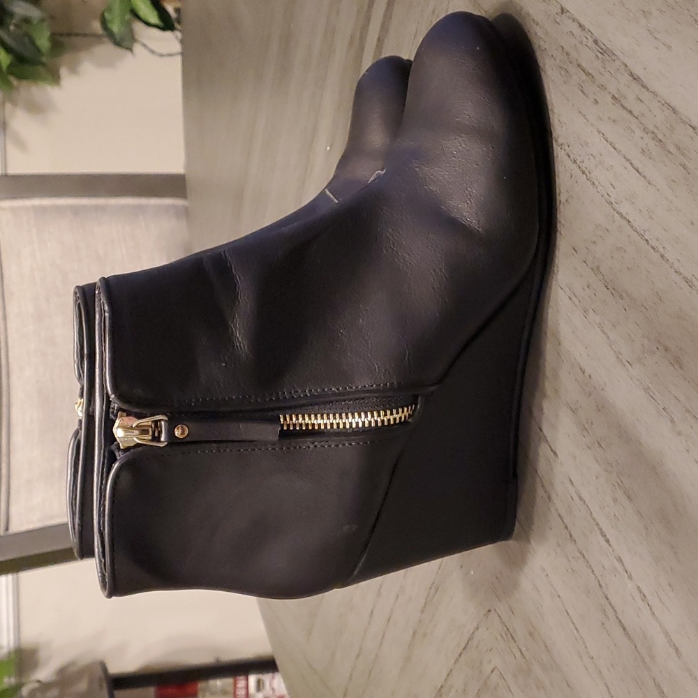Unlisted black wedge boots